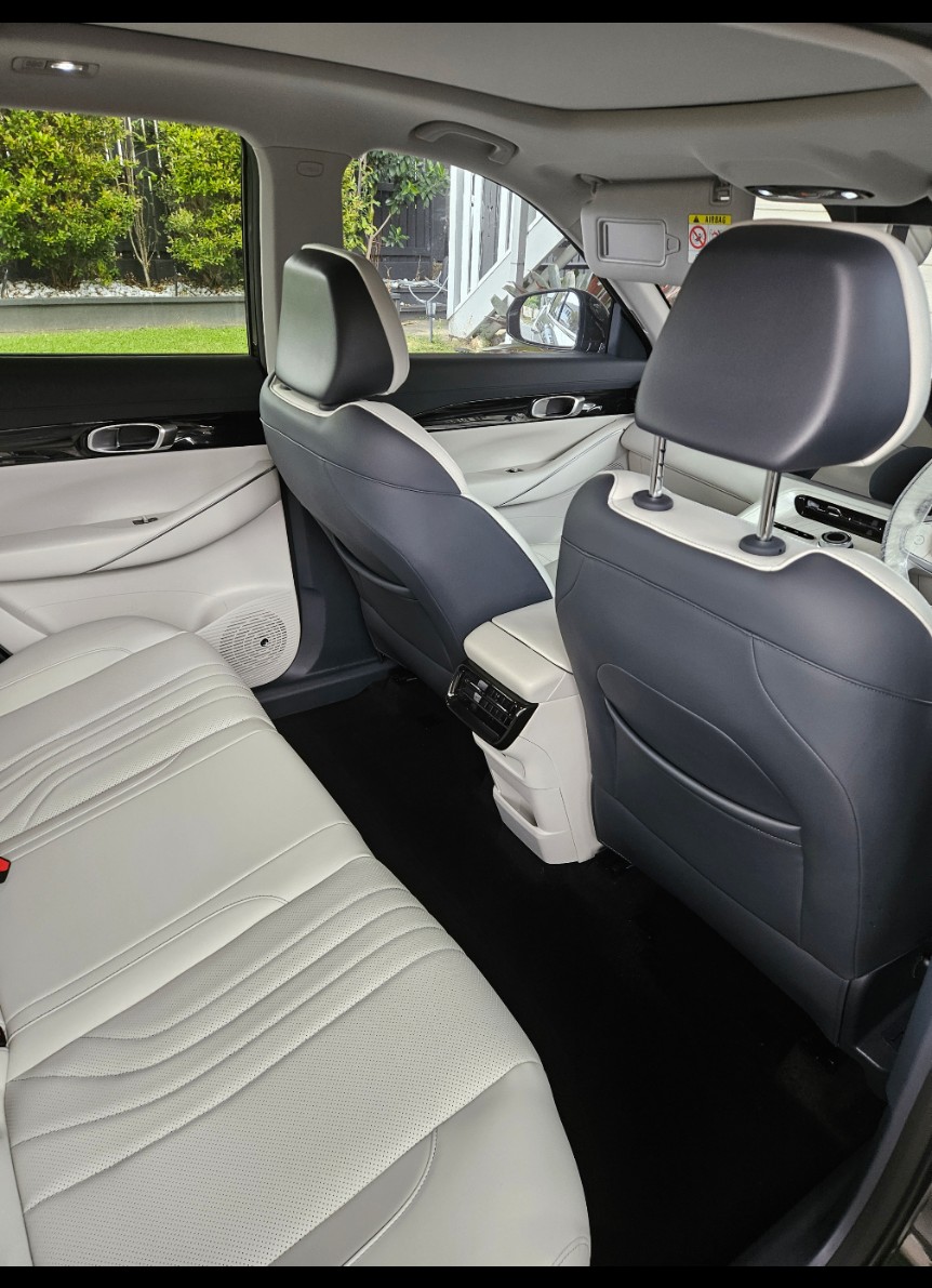 Cleaned light leather rear seats of an SUV